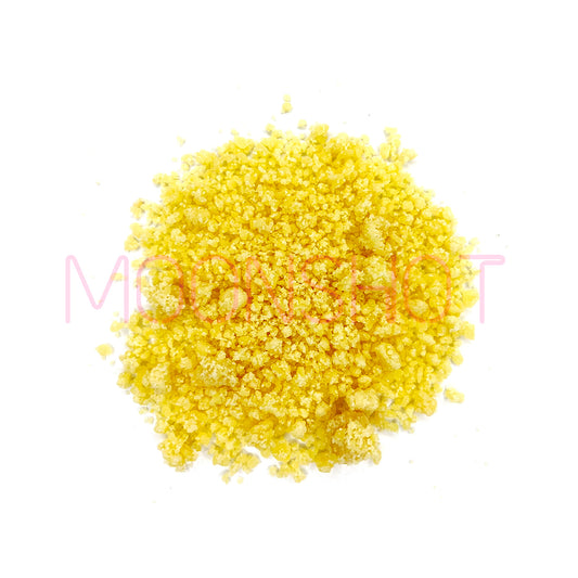 A picture of extremely high quality THCa crumble in a pile on a white background